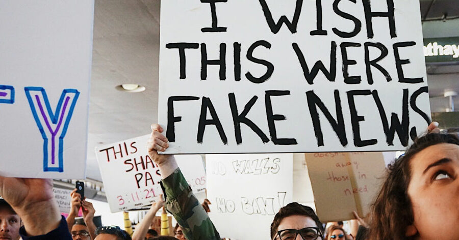 people protesting fake news