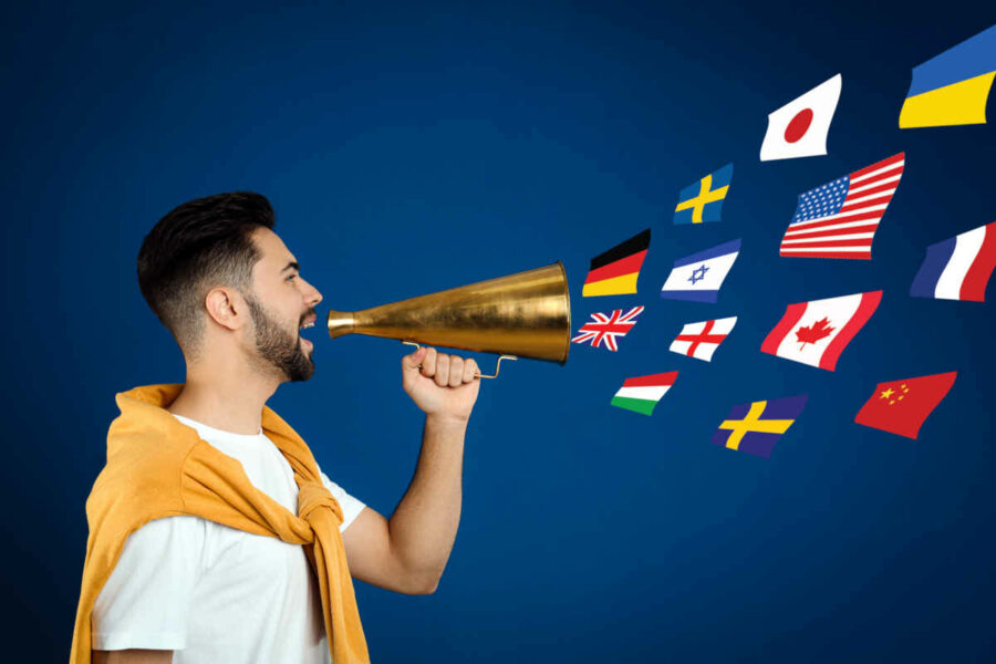 Man with a megaphone speaking in different languages